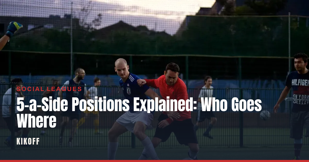 Five-a-side players positioned around a caged pitch during a social game